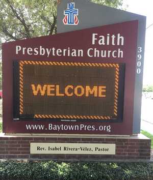Church sign on Main Street with welcome message