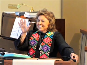 Pastor Isabel at Lectern