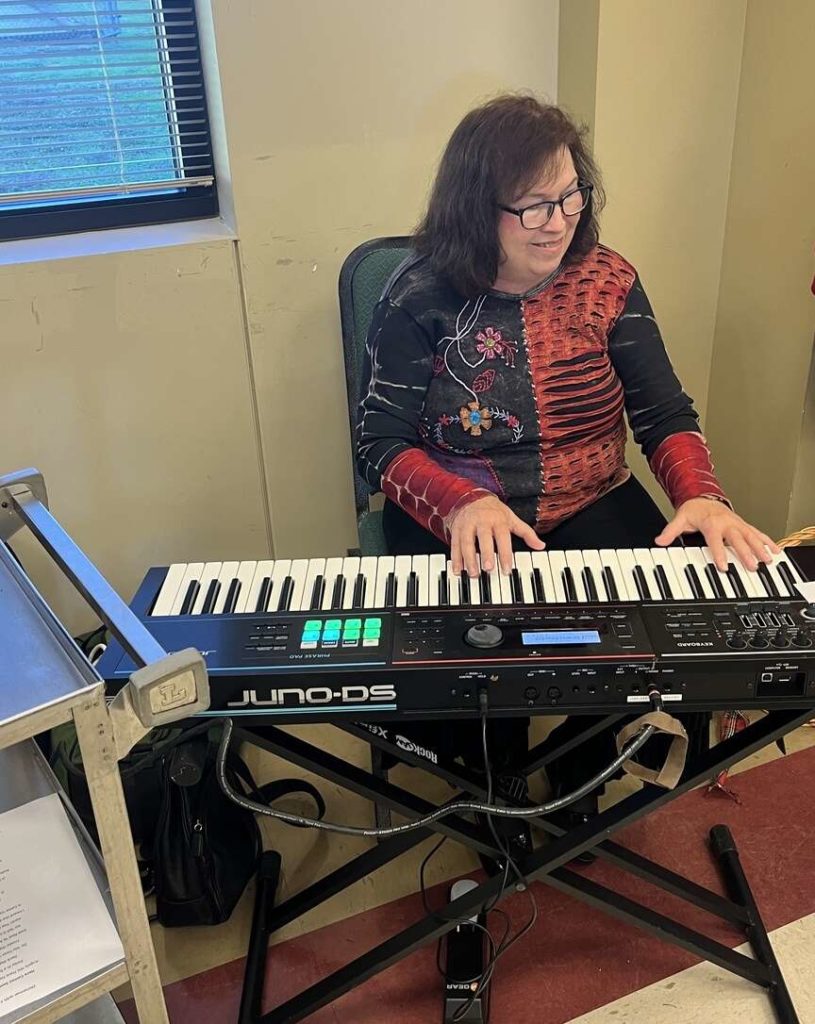 Brenda playing Christmas music