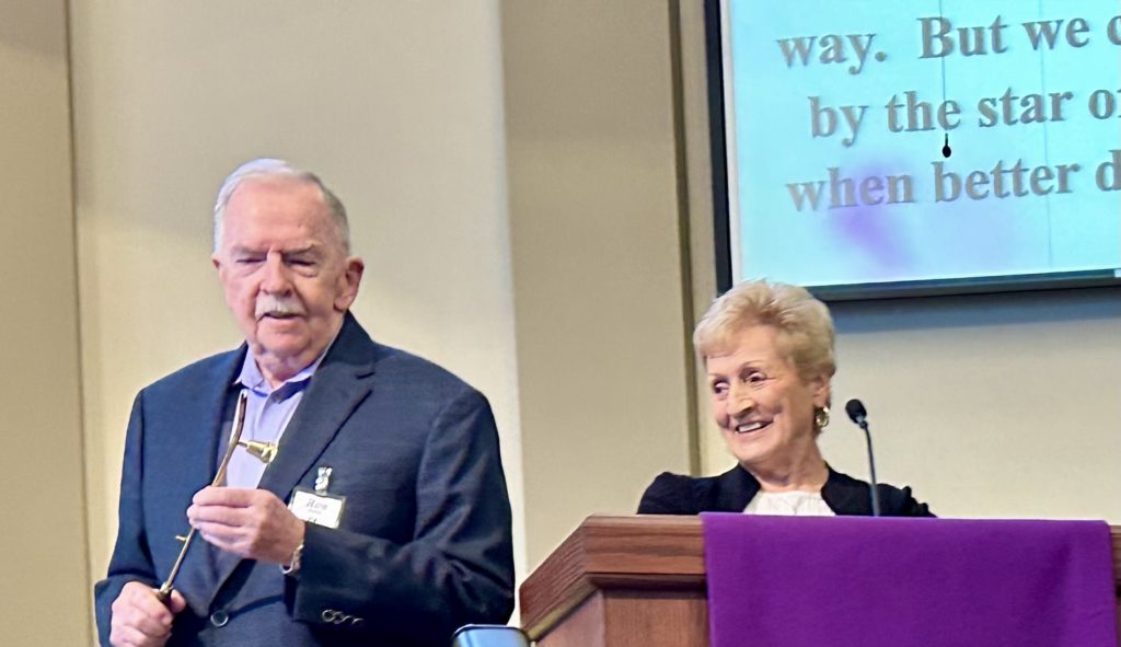 Ron preparing to light advent candle